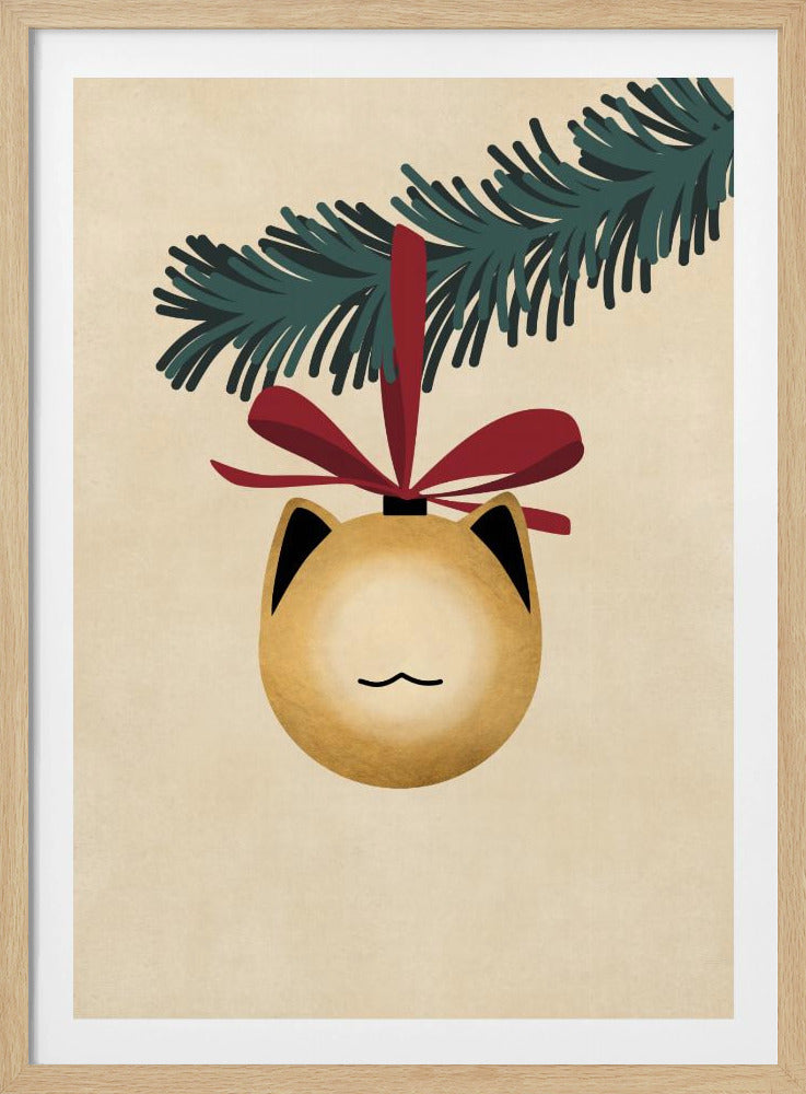 A minimalist illustration of a golden-yellow Christmas ornament shaped like a cat's head, complete with black-tipped ears and a simple line mouth. It hangs from a dark green pine branch by a festive red ribbon, all set against a textured beige background and framed in black. Artwork