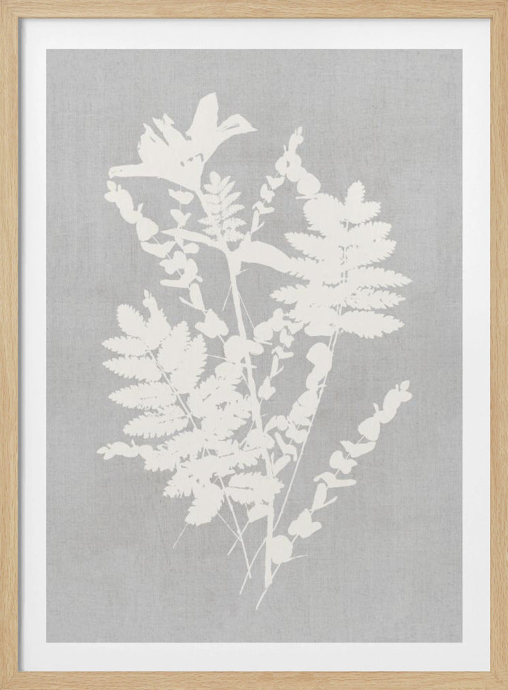 A framed artwork featuring a white silhouette of a botanical arrangement with ferns, flowers, and leaves against a textured light grey background. Decor