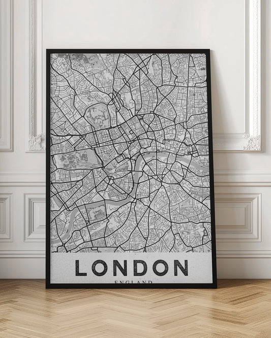 A minimalist black and white map of London, showcasing its intricate street layout, the River Thames, and various parks. The map is set within a simple black frame, and the word 'LONDON' is printed in a bold, black, sans-serif font on a white banner at the bottom. Artwork