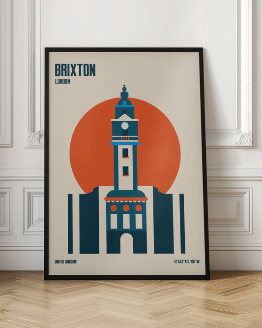 A minimalist travel poster of Brixton, London, featuring a stylized blue and white clock tower set against a large orange circle on a cream background. The text 'BRIXTON LONDON' is at the top, and 'UNITED KINGDOM' with geographic coordinates are at the bottom. The entire print is enclosed in a simple black frame. Poster