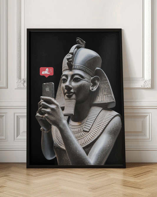 A humorous digital artwork depicting a detailed, dark grey stone bust of an ancient Egyptian pharaoh holding a modern smartphone and looking at it with a slight smile. A red social media notification with a sphinx icon and the number 5 floats next to the phone against a solid black background. Wall Art