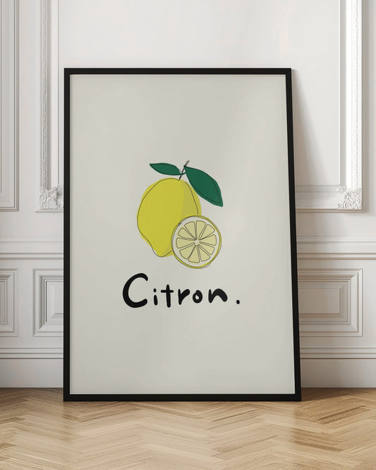 A minimalist art print in a black frame featuring a yellow lemon with green leaves and a lemon slice. Below the illustration, the word 'Citron.' is written in a simple black font against an off-white background. Artwork