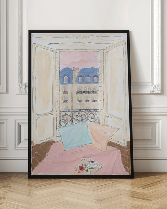 A watercolor illustration of a view from an open window in Paris. In the foreground, a cozy nook with a pink blanket, a blue pillow, a cup of coffee, and a red rose. Outside, traditional Parisian apartment buildings with blue mansard roofs are visible under a soft pink sky. Print