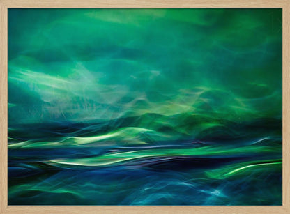 A framed abstract artwork featuring a luminous, dreamlike landscape of swirling green and blue light. The top half glows with a vibrant green haze like the northern lights, while the bottom half depicts dark blue and green waves with bright, energetic highlights, creating a sense of mystical water and sky. Wall Art