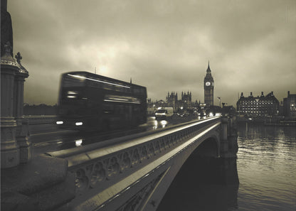 A framed, sepia-toned long-exposure photograph of London. A double-decker bus is shown in motion blur as it crosses Westminster Bridge. In the background, the Big Ben clock tower and the Houses of Parliament are visible against a cloudy sky, with lights reflecting on the wet road and the River Thames. Wall Art