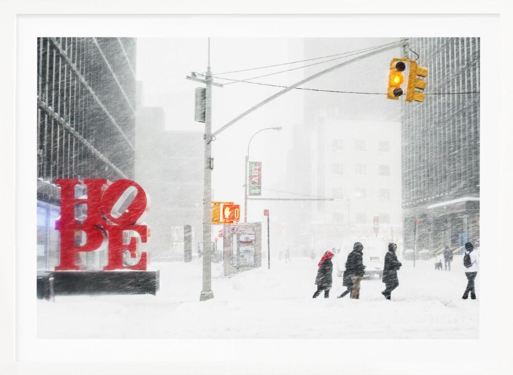 A photograph of a busy city street during a heavy snowstorm. In the foreground on the left, a large, bright red sculpture spells out the word 'HOPE', providing a stark contrast to the muted, white, and gray tones of the snowy scene. Pedestrians in winter coats are crossing the snow-covered street, and tall buildings are partially obscured by the falling snow in the background. Wall Art