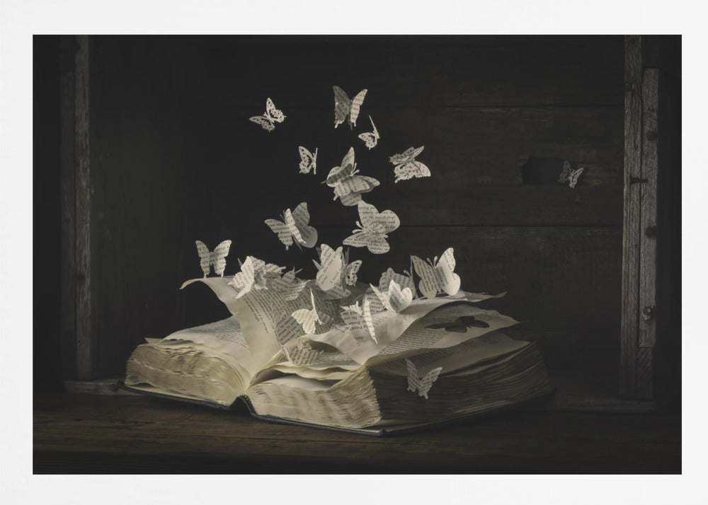 A conceptual artwork depicting an open vintage book on a dark wooden table. Dozens of butterflies, crafted from the book's own printed pages, are emerging and flying upwards as if the story is coming to life against a dark, rustic background. Artwork