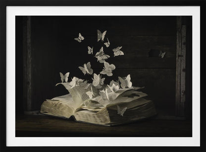 A conceptual artwork depicting an open vintage book on a dark wooden table. Dozens of butterflies, crafted from the book's own printed pages, are emerging and flying upwards as if the story is coming to life against a dark, rustic background. Artwork