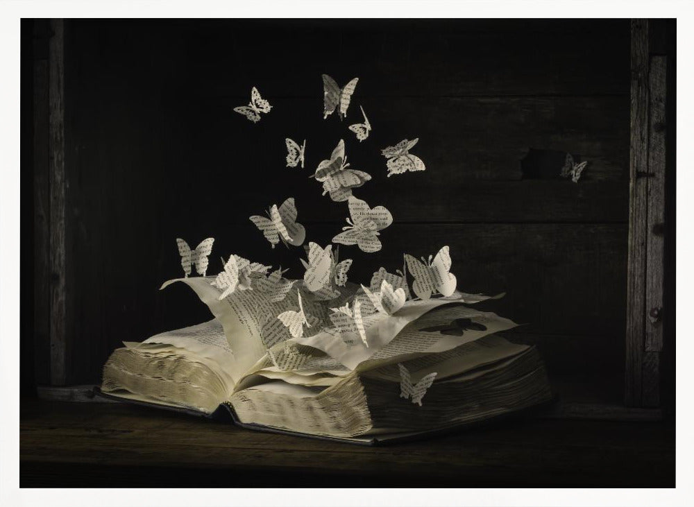 A conceptual artwork depicting an open vintage book on a dark wooden table. Dozens of butterflies, crafted from the book's own printed pages, are emerging and flying upwards as if the story is coming to life against a dark, rustic background. Artwork