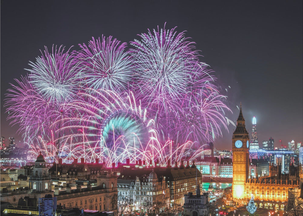 A vibrant night-time cityscape of London featuring a massive fireworks display in purple, pink, and white exploding over landmarks like the London Eye and the illuminated Big Ben clock tower, all within a silver frame. Decor