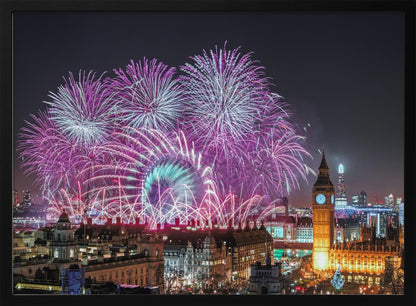A vibrant night-time cityscape of London featuring a massive fireworks display in purple, pink, and white exploding over landmarks like the London Eye and the illuminated Big Ben clock tower, all within a silver frame. Decor
