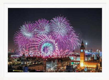 A vibrant night-time cityscape of London featuring a massive fireworks display in purple, pink, and white exploding over landmarks like the London Eye and the illuminated Big Ben clock tower, all within a silver frame. Decor