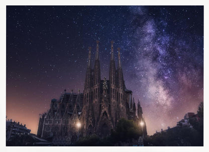A fantastical night view of the Sagrada Familia in Barcelona, its intricate spires reaching up towards a magnificent, starry sky filled with the purple and pink hues of the Milky Way galaxy, all enclosed in a silver frame. Artwork