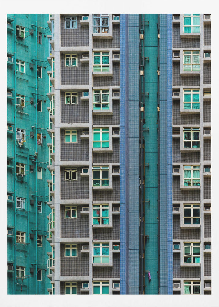 A striking close-up of two densely packed apartment buildings, one with a teal tiled facade and the other with a grey and blue tiled facade, creating a strong pattern of repeating windows and geometric lines. Decor