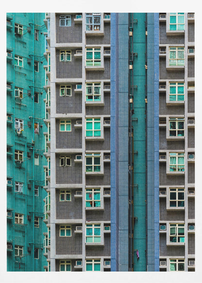 A striking close-up of two densely packed apartment buildings, one with a teal tiled facade and the other with a grey and blue tiled facade, creating a strong pattern of repeating windows and geometric lines. Decor