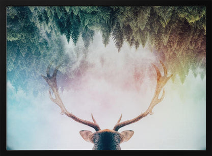 A surreal double-exposure artwork featuring the back of a deer's head with large antlers, blended with an image of a misty pine forest. The forest is reflected above the antlers against a soft, pastel-colored background, all enclosed in a silver frame. Print