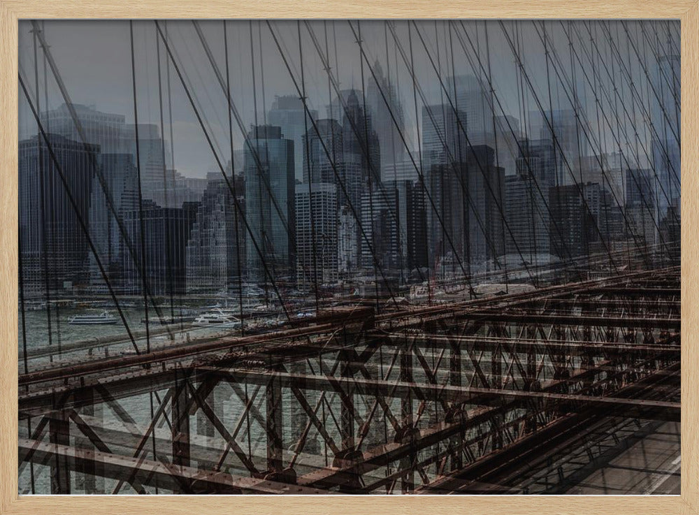 A framed, stylized photograph showing a double exposure of the New York City skyline and the intricate steel structure and cables of the Brooklyn Bridge, creating a dense, layered urban scene with a cool, moody color palette. Decor