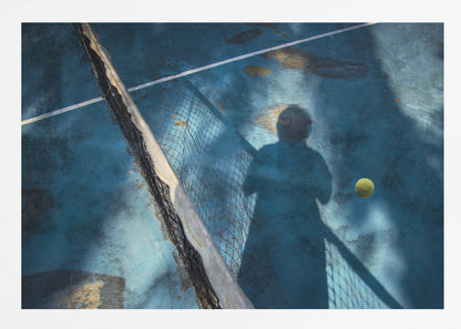 An artistic, high-angle shot of a weathered blue tennis court. The shadow of a tennis player holding a racket is cast across the court, with a yellow tennis ball suspended in mid-air nearby. A tattered tennis net runs diagonally across the frame, all enclosed within a silver border. Wall Art
