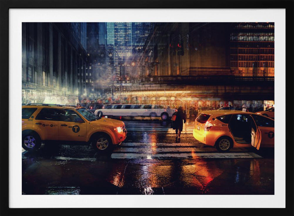 A cinematic night photograph of a busy, wet city street, likely New York, with yellow taxis in the foreground and a white stretch limousine in the background. A pedestrian crosses the street as the city lights reflect off the wet pavement, with illuminated skyscrapers towering above. Decor