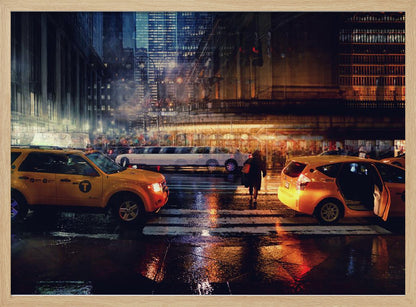 A cinematic night photograph of a busy, wet city street, likely New York, with yellow taxis in the foreground and a white stretch limousine in the background. A pedestrian crosses the street as the city lights reflect off the wet pavement, with illuminated skyscrapers towering above. Decor