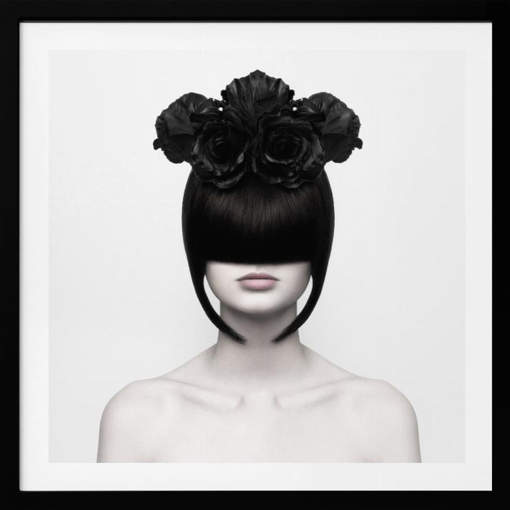 A stylized black and white portrait of a woman with a sleek black bob hairstyle where the bangs completely cover her eyes. She wears a large, elaborate headpiece made of black roses. Her expression is neutral, showing only her mouth and chin. The image is set against a plain white background and enclosed in a light wood frame. Print