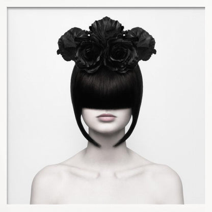 A stylized black and white portrait of a woman with a sleek black bob hairstyle where the bangs completely cover her eyes. She wears a large, elaborate headpiece made of black roses. Her expression is neutral, showing only her mouth and chin. The image is set against a plain white background and enclosed in a light wood frame. Print