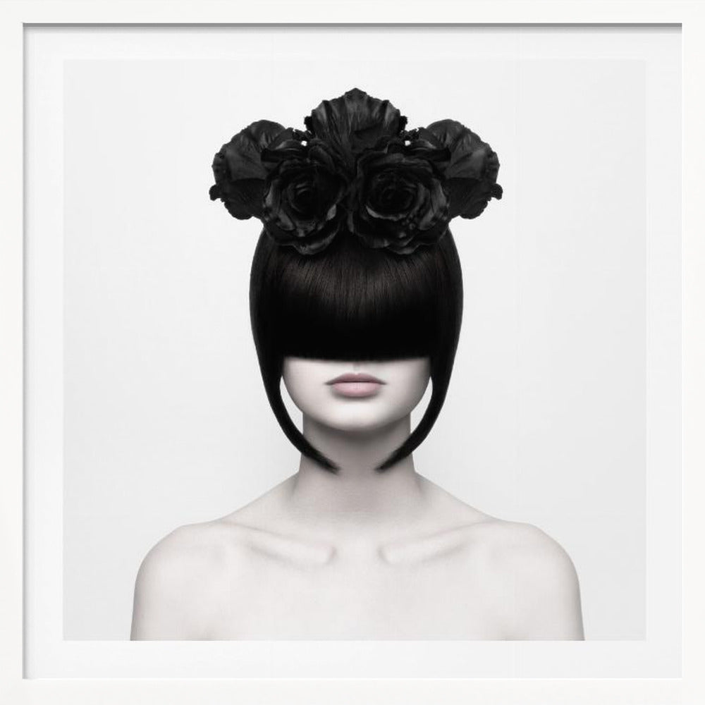 A stylized black and white portrait of a woman with a sleek black bob hairstyle where the bangs completely cover her eyes. She wears a large, elaborate headpiece made of black roses. Her expression is neutral, showing only her mouth and chin. The image is set against a plain white background and enclosed in a light wood frame. Print