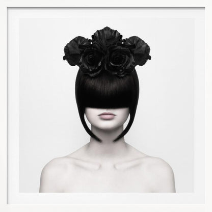 A stylized black and white portrait of a woman with a sleek black bob hairstyle where the bangs completely cover her eyes. She wears a large, elaborate headpiece made of black roses. Her expression is neutral, showing only her mouth and chin. The image is set against a plain white background and enclosed in a light wood frame. Print