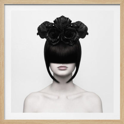 A stylized black and white portrait of a woman with a sleek black bob hairstyle where the bangs completely cover her eyes. She wears a large, elaborate headpiece made of black roses. Her expression is neutral, showing only her mouth and chin. The image is set against a plain white background and enclosed in a light wood frame. Print