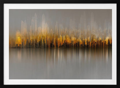 An abstract painting of a city skyline at sunset or sunrise, with buildings glowing in shades of gold, orange, and brown. The hazy, gray sky shows faint outlines of taller buildings in the background. The city is reflected in the water below, with the colors stretched into long, vertical streaks that blend into the gray foreground. The entire piece is enclosed in a simple silver frame. Wall Art