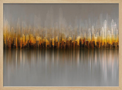 An abstract painting of a city skyline at sunset or sunrise, with buildings glowing in shades of gold, orange, and brown. The hazy, gray sky shows faint outlines of taller buildings in the background. The city is reflected in the water below, with the colors stretched into long, vertical streaks that blend into the gray foreground. The entire piece is enclosed in a simple silver frame. Wall Art