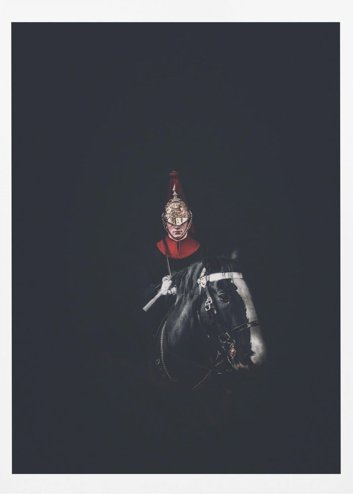 A dramatic portrait of a British Royal Guard on a black horse, emerging from a completely black background. The guard is wearing a traditional uniform with a red collar and a shiny gold helmet with a red plume. Poster