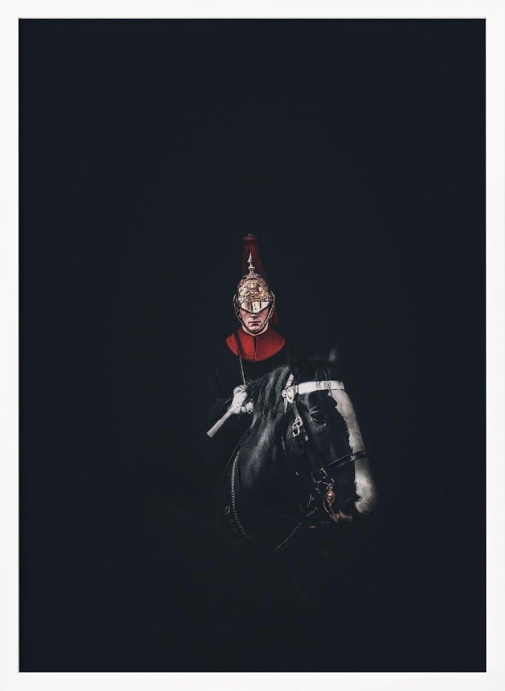 A dramatic portrait of a British Royal Guard on a black horse, emerging from a completely black background. The guard is wearing a traditional uniform with a red collar and a shiny gold helmet with a red plume. Poster