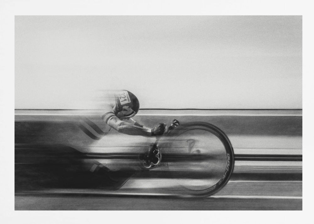 A black and white photograph captured with motion blur, showing a cyclist in an aerodynamic position racing at high speed. The background is blurred into horizontal lines, emphasizing the velocity. The image is enclosed in a silver frame. Wall Art