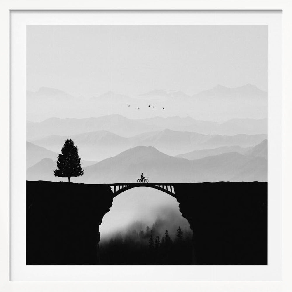 A minimalist black and white artwork featuring the silhouette of a cyclist crossing a high arched bridge between two cliffs. A lone tree stands on one cliff, while layers of misty mountains fill the background, creating a sense of depth and solitude. Poster