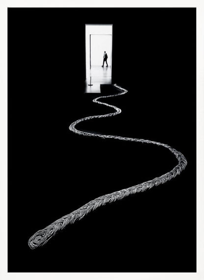 A high-contrast, black and white photograph of a thick, silver, braided rope winding across a black floor, leading towards a brightly lit doorway in the distance where a silhouetted man is walking away. Wall Art