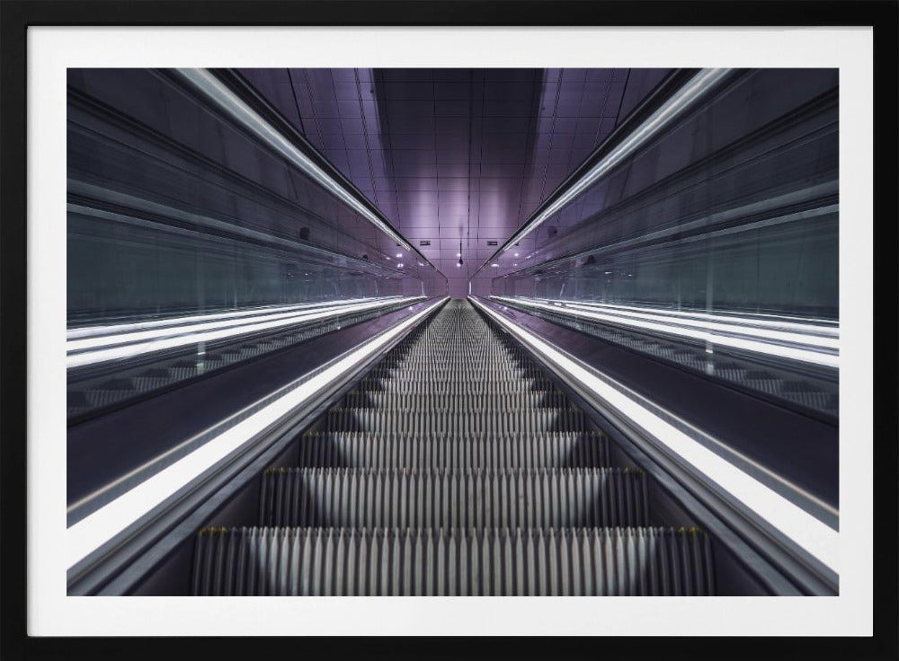 A symmetrical, first-person view looking down a long, empty escalator in a modern subway station, with bright white lights lining the handrails and a purple glow on the ceiling, creating a futuristic and infinite perspective. Wall Art