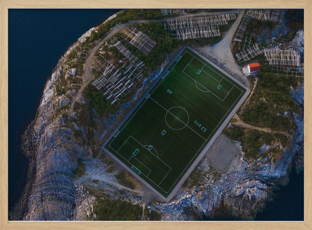An art print featuring a distant view of a football field under a wide sky, evoking a sense of space and tranquility. Wall Art