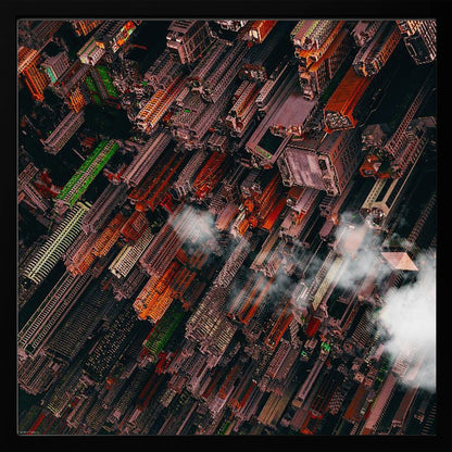 A dramatic, high-angle aerial photograph looking straight down into a super-dense, futuristic cityscape with towering skyscrapers packed together, featuring pops of orange and green among the dark buildings. Wisps of clouds float between the towers, and the image is presented in a light wood frame. Print