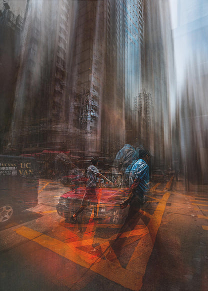 An abstract, vertically oriented photograph of a city street with a strong motion blur effect. Towering buildings are stretched vertically, creating a surreal, melting appearance. In the foreground, semi-transparent figures of people cross a street with bright orange markings, near a red car, suggesting a chaotic and energetic urban scene. Artwork