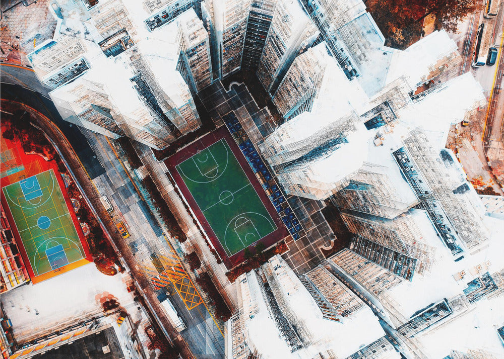 A dizzying top-down aerial view of a dense city, where stark white skyscrapers tower over two vibrant basketball courts, one green and the other multicolored. The abstract, high-contrast style highlights the geometric patterns of urban life, all enclosed within a silver frame. Poster