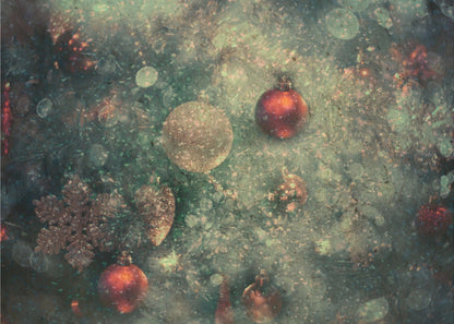 A vintage-style, textured image of Christmas ornaments on a tree, including red and gold baubles and a snowflake. The artwork has a grunge, distressed feel with soft bokeh lights and is presented in a silver frame. Poster