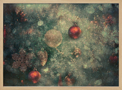 A vintage-style, textured image of Christmas ornaments on a tree, including red and gold baubles and a snowflake. The artwork has a grunge, distressed feel with soft bokeh lights and is presented in a silver frame. Poster