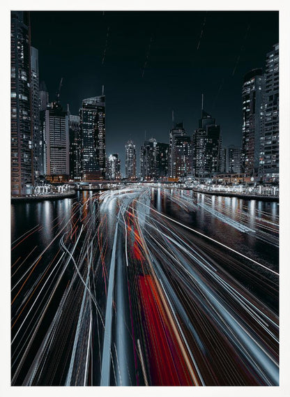 A dynamic long-exposure photograph of a bustling city marina at night. In the foreground, vibrant streaks of red and white light from moving boats cut across the dark water. In the background, a modern skyline of illuminated skyscrapers stands against a dark night sky, creating a futuristic and energetic scene. Poster