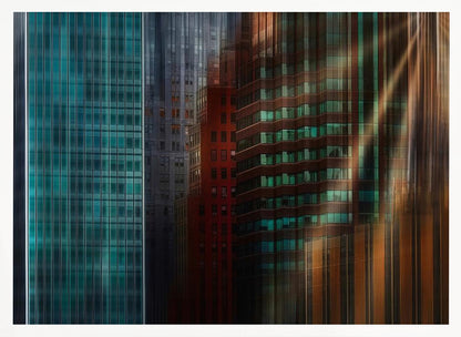 An abstract cityscape artwork in a silver frame, featuring a teal glass skyscraper on the left transitioning to red and brown buildings on the right with a strong vertical motion blur effect, creating a dynamic sense of movement. Decor