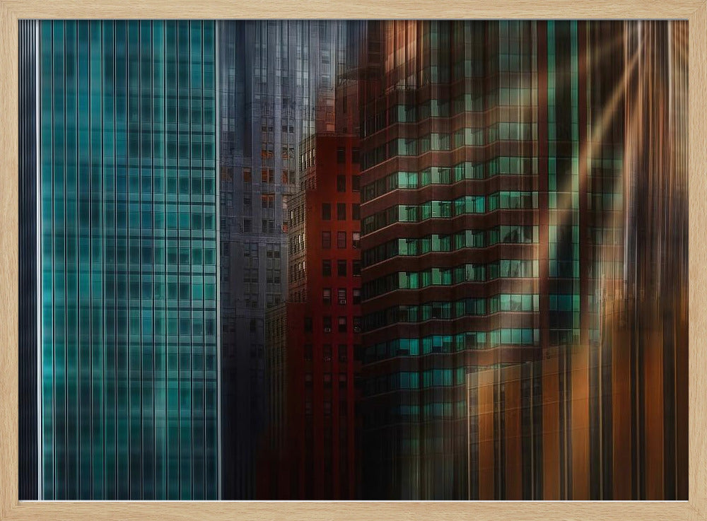 An abstract cityscape artwork in a silver frame, featuring a teal glass skyscraper on the left transitioning to red and brown buildings on the right with a strong vertical motion blur effect, creating a dynamic sense of movement. Decor