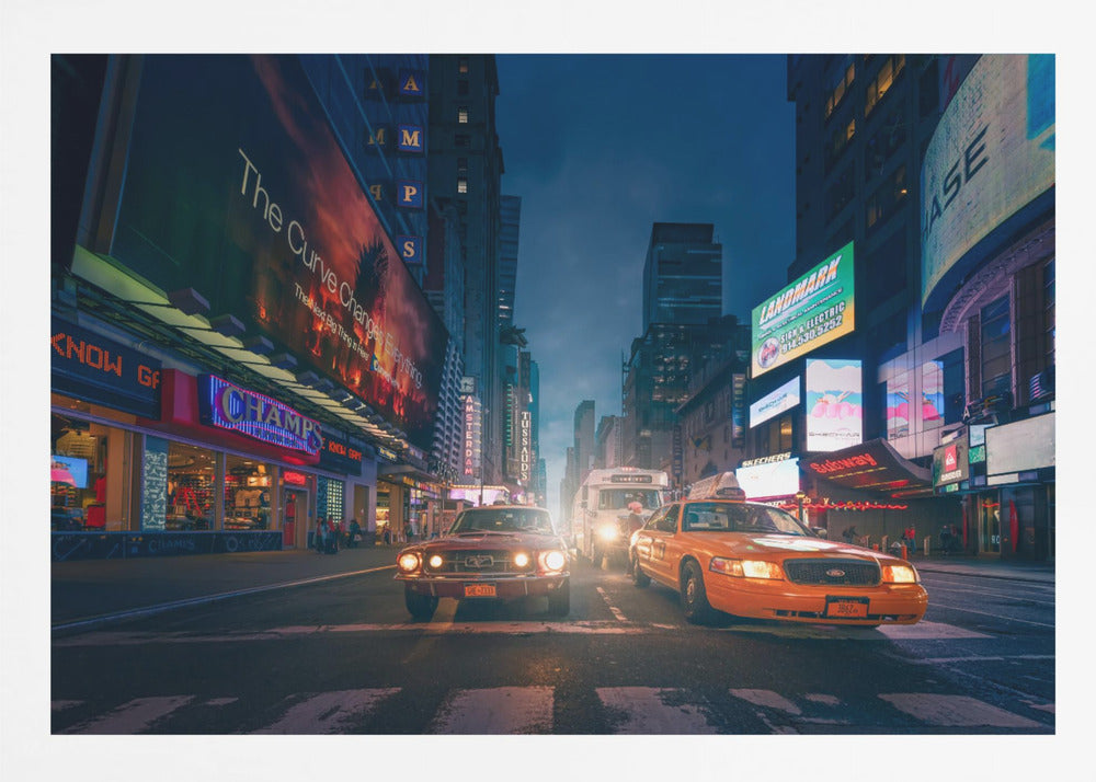 A cinematic night-time view of a busy city street, likely Times Square, with a vintage red muscle car and a yellow taxi cab side-by-side in the foreground, surrounded by towering skyscrapers and glowing neon billboards. Artwork