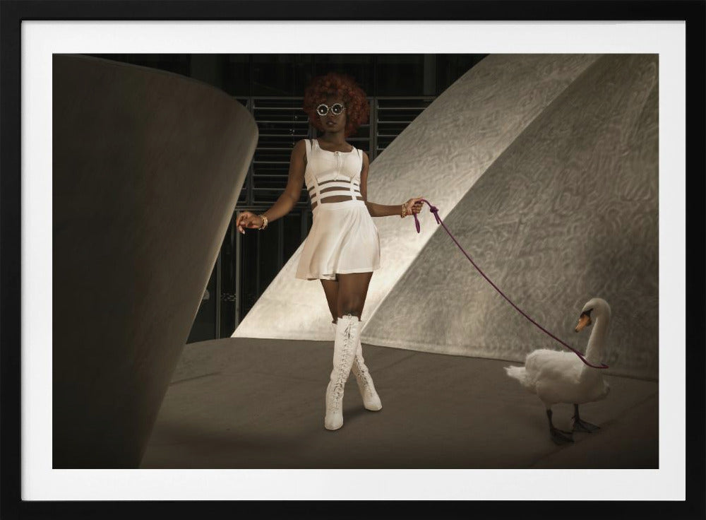 A stylish Black woman with a red afro, wearing a white cut-out dress, round sunglasses, and white knee-high boots, holds a purple leash attached to a white swan as they walk through a modern architectural setting with dramatic lighting. Wall Art