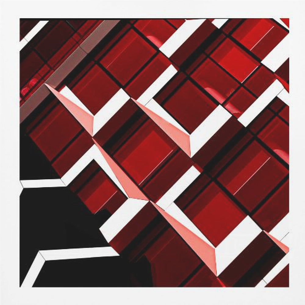 A close-up, angular photograph of a modern building's facade, framed in light wood. The composition is a dynamic geometric pattern of glossy red square panels, stark white lines, and deep black shadows, creating a sense of depth and abstract complexity. Wall Art