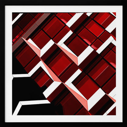 A close-up, angular photograph of a modern building's facade, framed in light wood. The composition is a dynamic geometric pattern of glossy red square panels, stark white lines, and deep black shadows, creating a sense of depth and abstract complexity. Wall Art